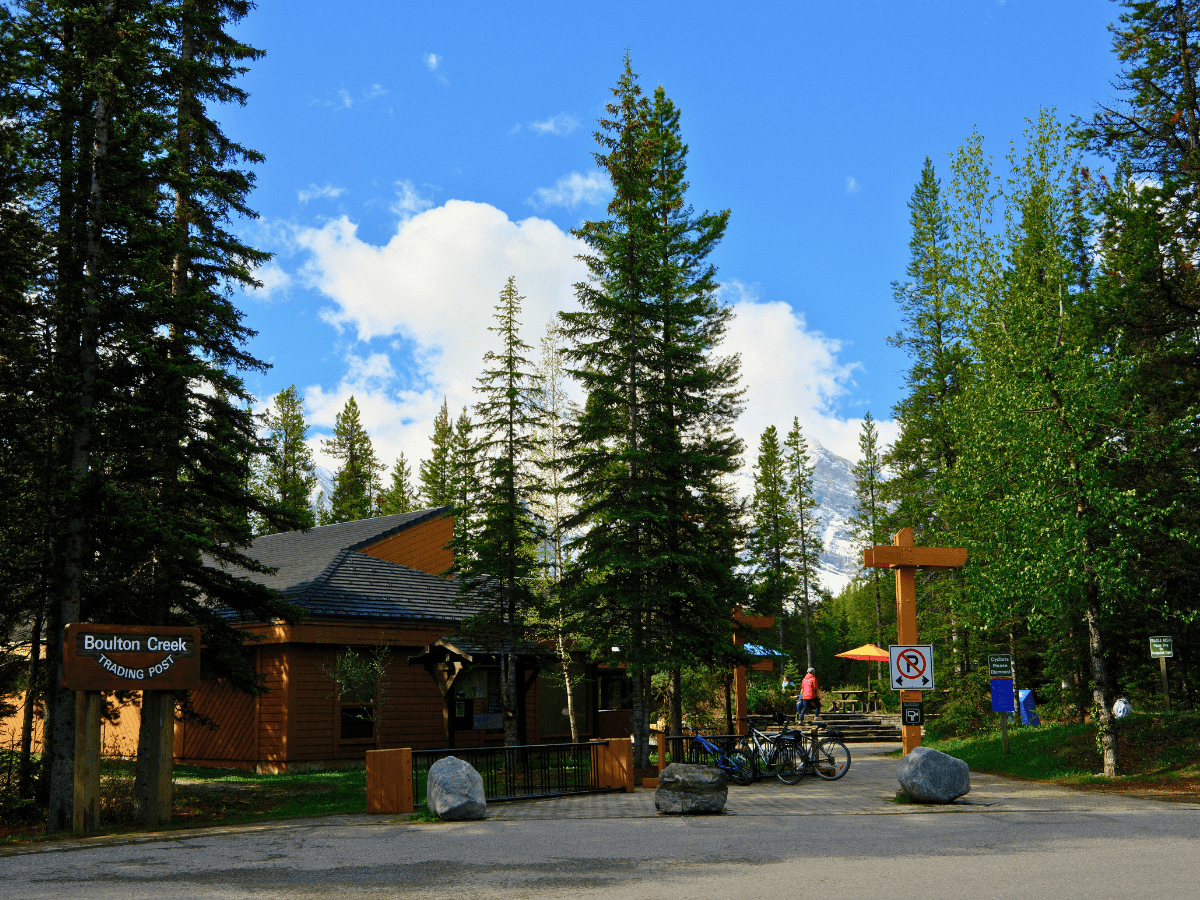 Boulton Creek Trading Post in Peter Lougheed Provincial Park, Kananaskis Country, Alberta, surrounded by forest and mountain scenery.